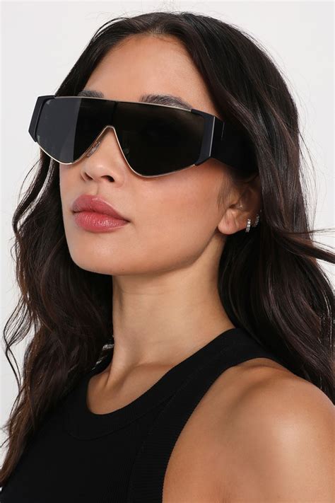 black shield sunglasses.